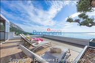 Luxus Penthouse Sara mit Meerblick, Dachterrasse mit Whirlpool, Sonnenliegen, Essbereich und Küche,  Parkplatz , E Ladestation inklusive. 